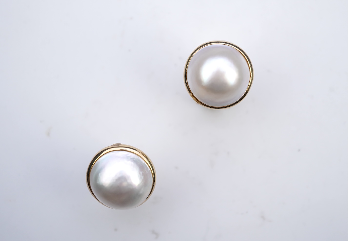 A pair of mabé cultured pearl earrings